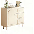 Creme gibt dem Sideboard einen farblichen Akzent